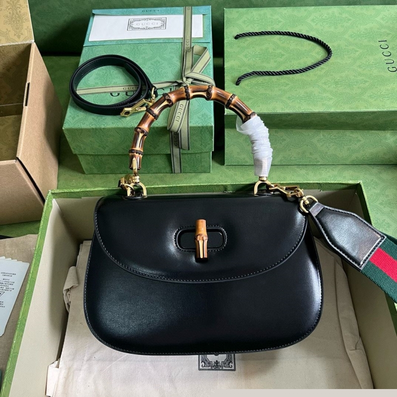 G*u*i top handle bags
